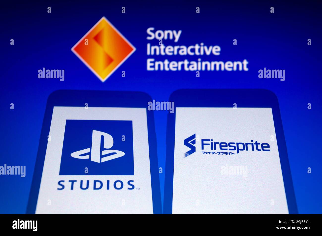 Asuncion, Paraguay. 8th Sep, 2021. Illustration photo - In-camera multiple  exposure image shows logos of PlayStation Studios and Firesprite on  smartphone backdropped by Sony Interactive Entertainment logo on screen.  Sony Interactive Entertainment (