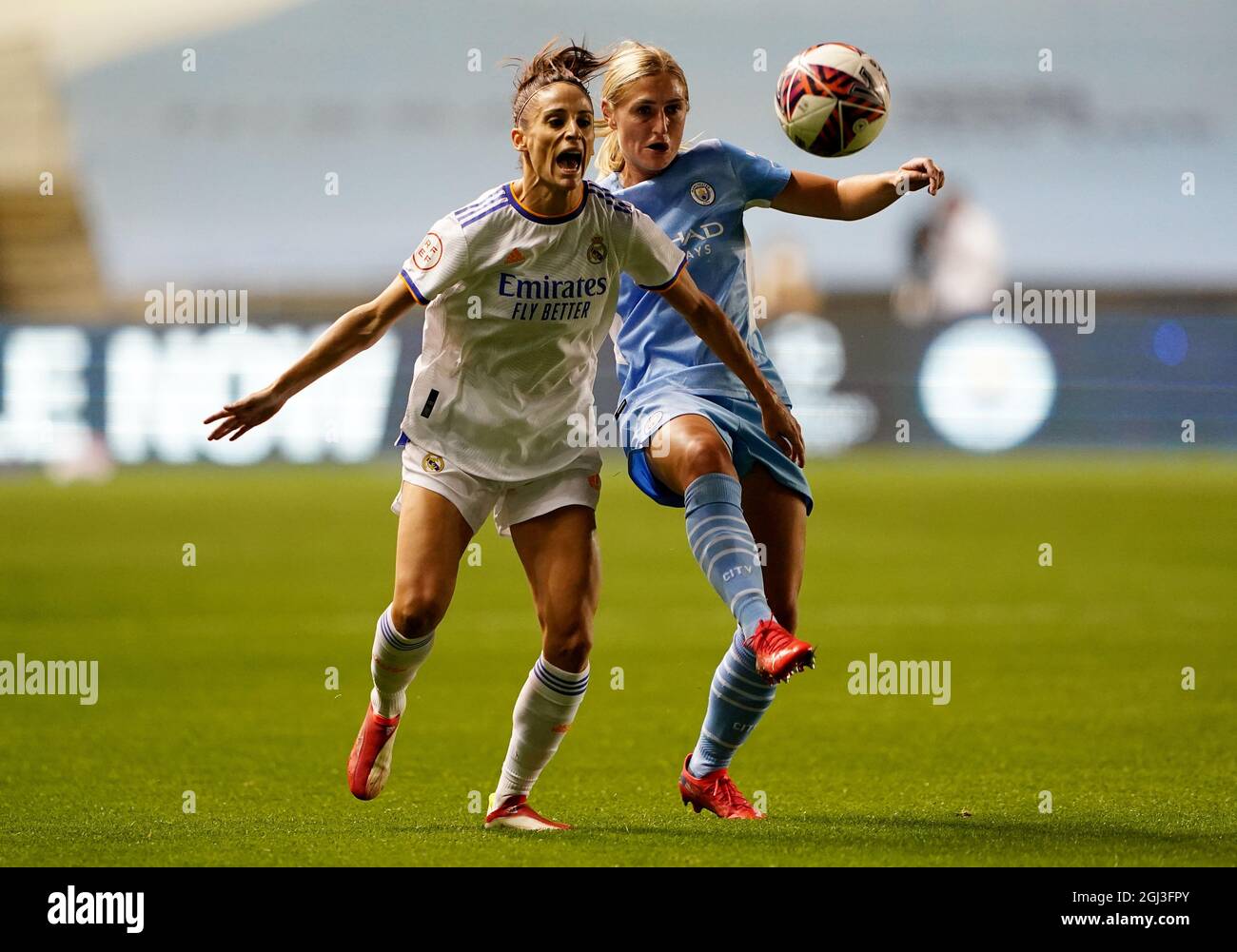 Manchester City’s Laura Coombs in action with real Madrid’s Aurelie Kaci during the UEFA Women's Champions League match at Academy Stadium, Manchester. Picture date: Wednesday September 8, 2021. Stock Photo