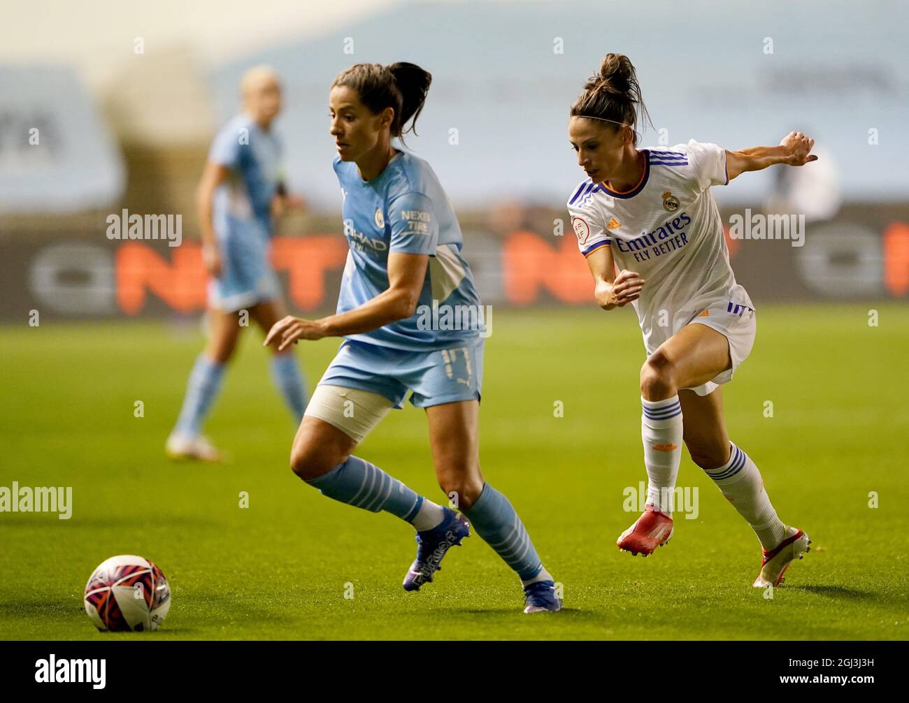 Manchester City’s Vicky Losada in action with Real Madrid’s Aurelie Kaci during the UEFA Women's Champions League match at Academy Stadium, Manchester. Picture date: Wednesday September 8, 2021. Stock Photo
