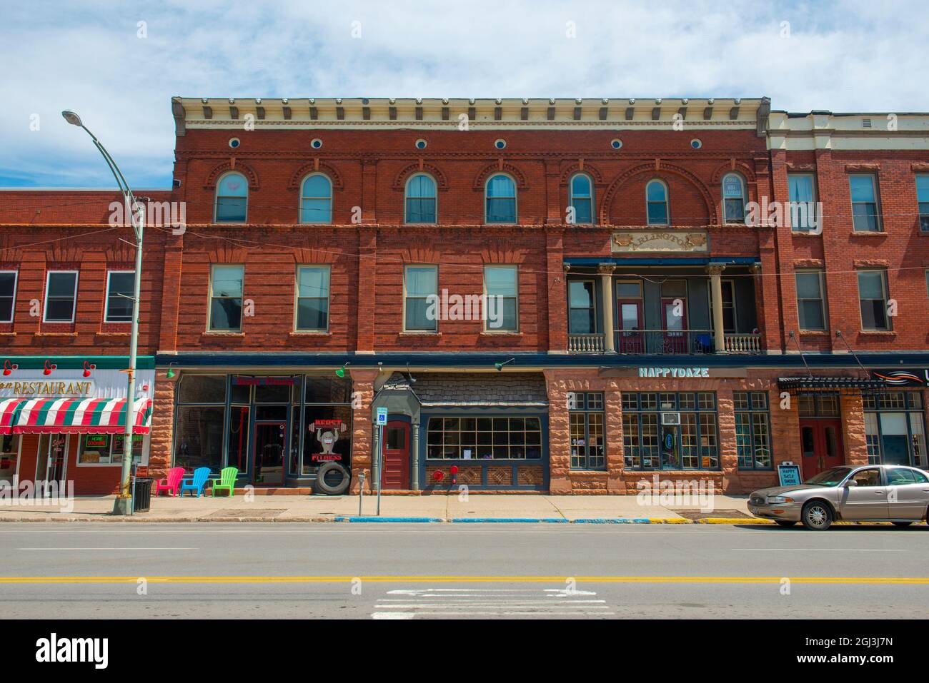 Historic sandstone and brick commercial buildings with Italianate style