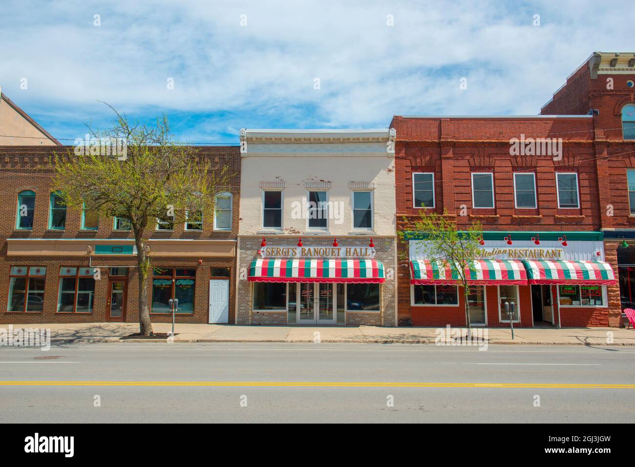 Historic sandstone and brick commercial buildings with Italianate style