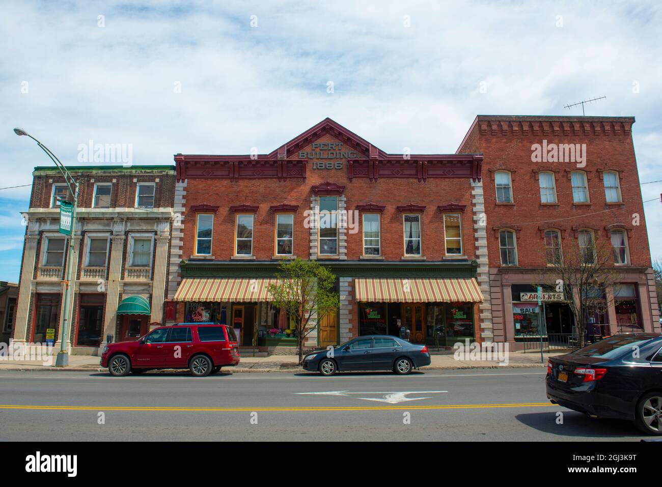Historic sandstone and brick commercial buildings with Italianate style
