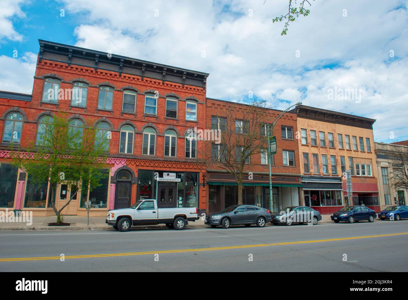 Historic sandstone and brick commercial buildings with Italianate style