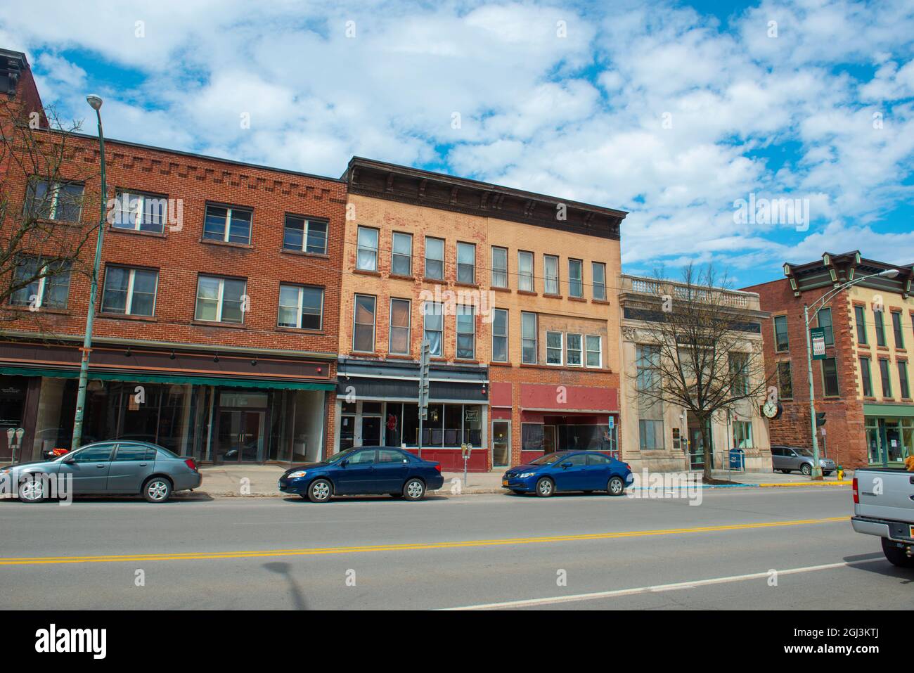 Historic sandstone and brick commercial buildings with Italianate style