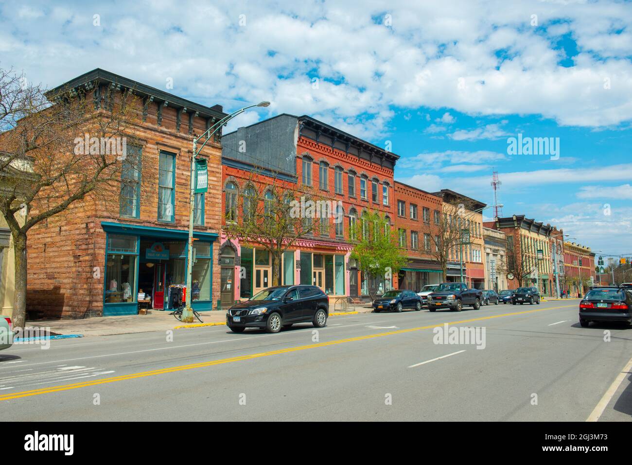 Historic sandstone and brick commercial buildings with Italianate style