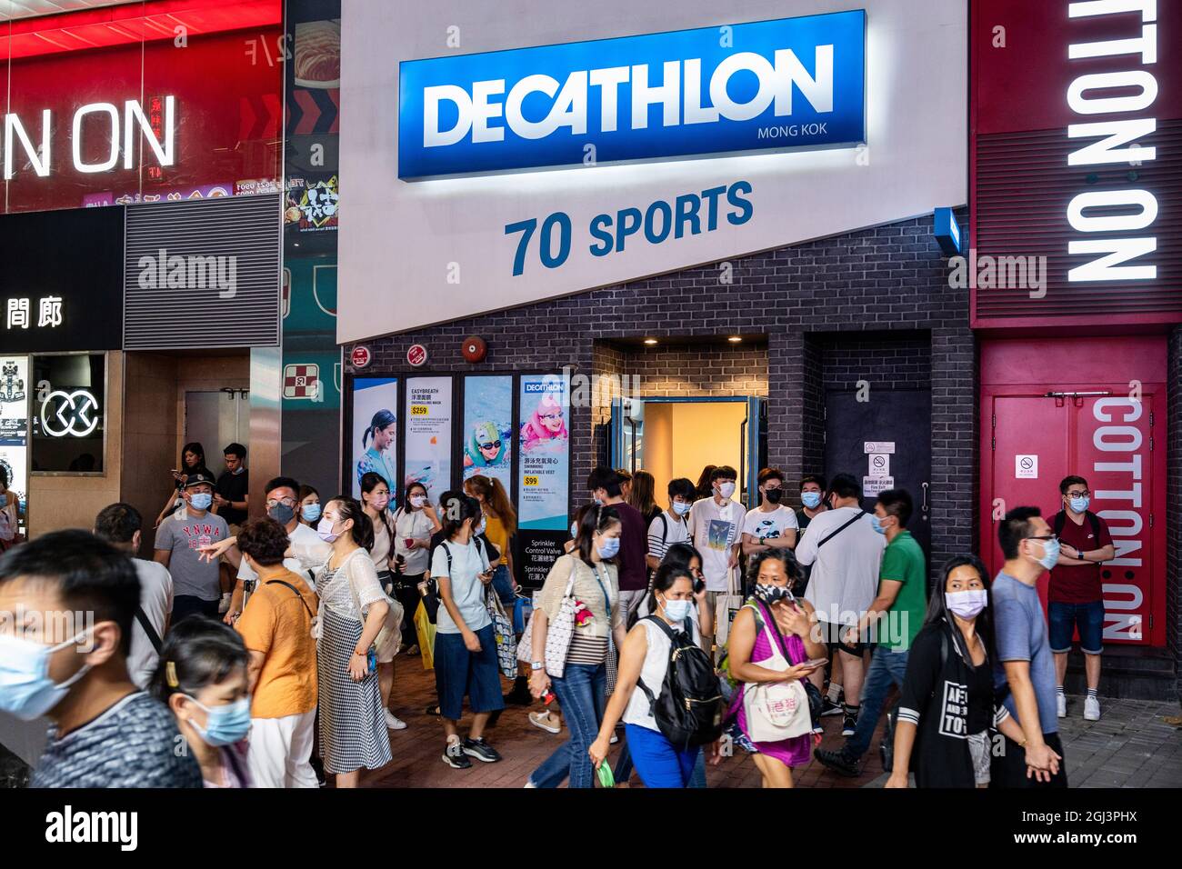 Pedestrians walk past the French sporting goods Decathlon and Australia's  largest clothing retailer Cotton On stores in Hong Kong. (Photo by Budrul  Chukrut / SOPA Images/Sipa USA Stock Photo - Alamy