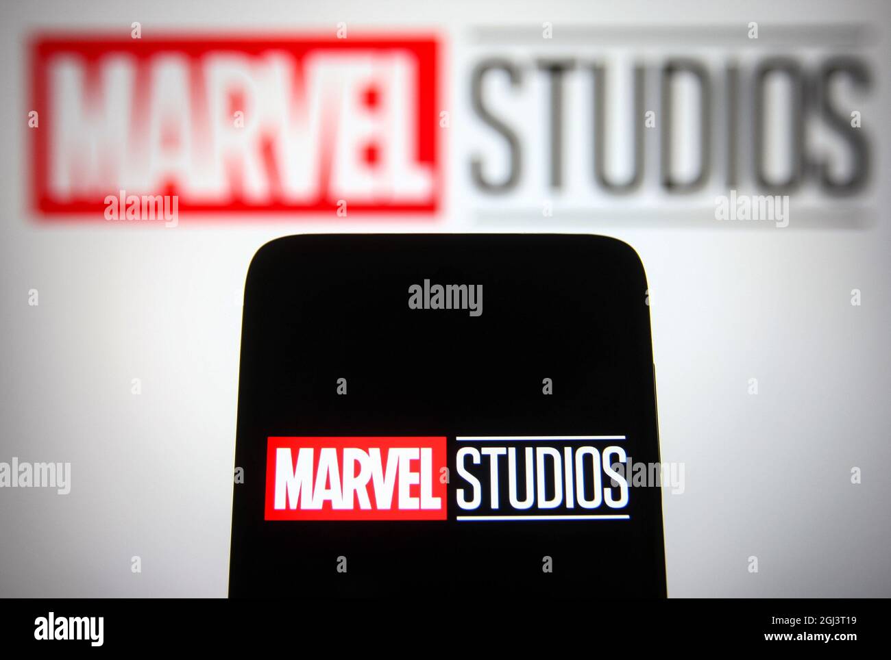 Marvel Using Computer In this photo illustration a Marvel Studios logo is seen on a ...