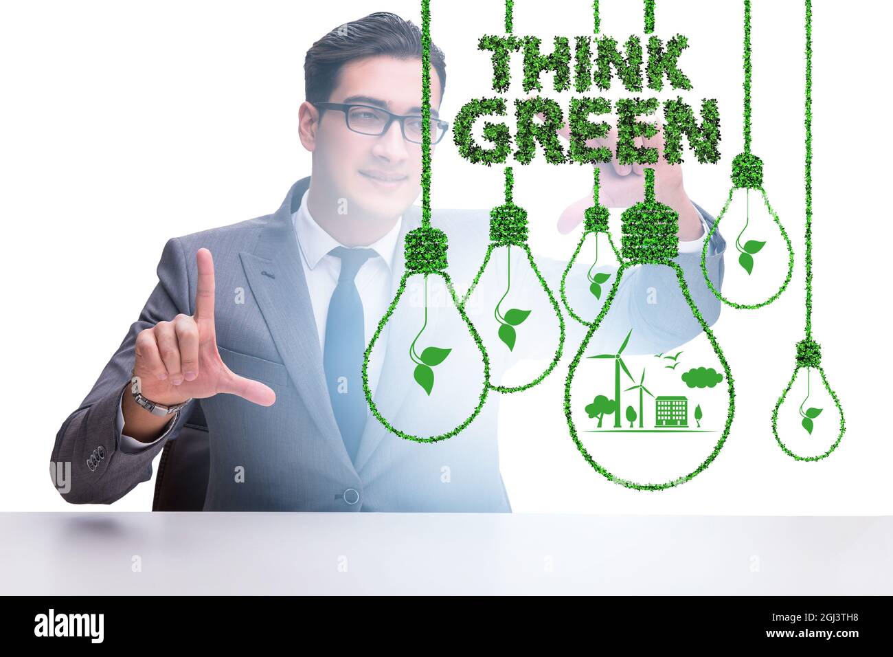 Think green ecological concept with the businessman Stock Photo - Alamy