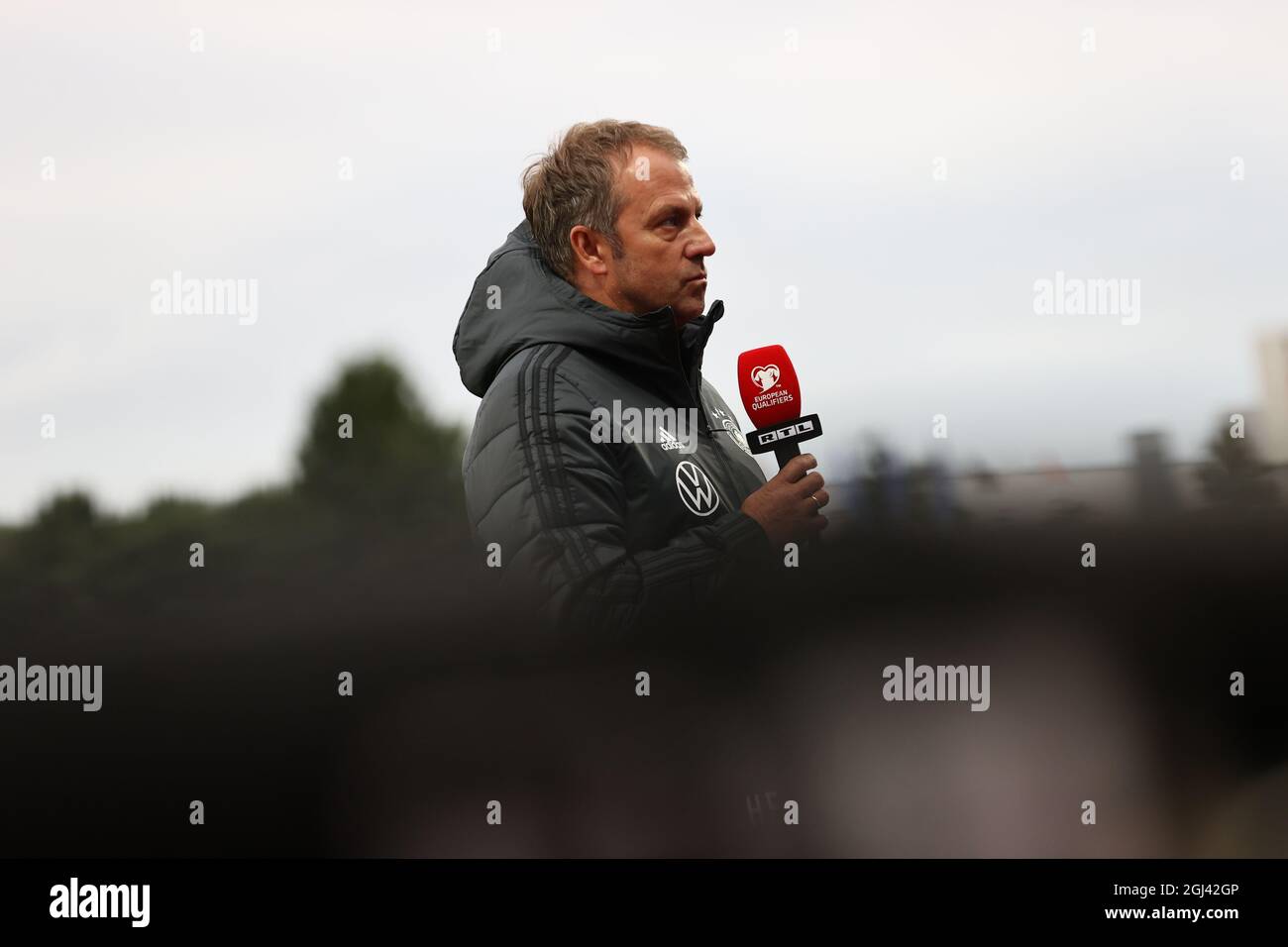 Reykjavik, Iceland. 08th Sep, 2021. Football: World Cup Qualification, Iceland - Germany, Group Stage, Group J, Matchday 6 at Laugardalsvöllur Stadium. German coach Hansi Flick gives an interview. Credit: Christian Charisius/dpa/Alamy Live News Stock Photo