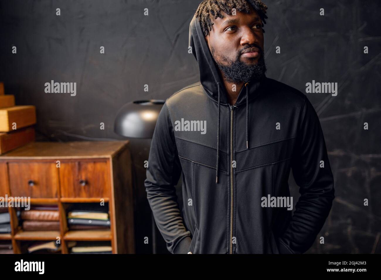 Portrait muscular man in hood hi-res stock photography and images - Alamy