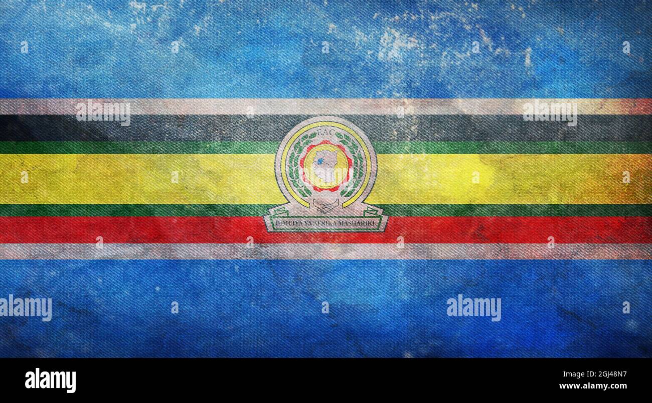 Minsk, Belarus - May, 2021: Flag of East African Community waving in the wind at flagpole on background of blue sky. 3d illustration. Stock Photo