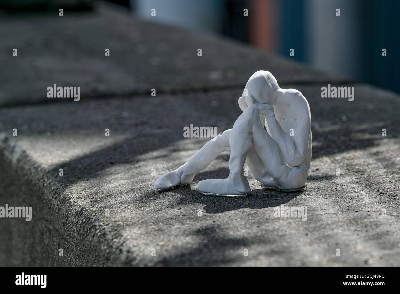 Hand built clay figure, on Georgia viaduct near makeshift homeless shelter, Vancouver, British Columbia, Canada Stock Photo