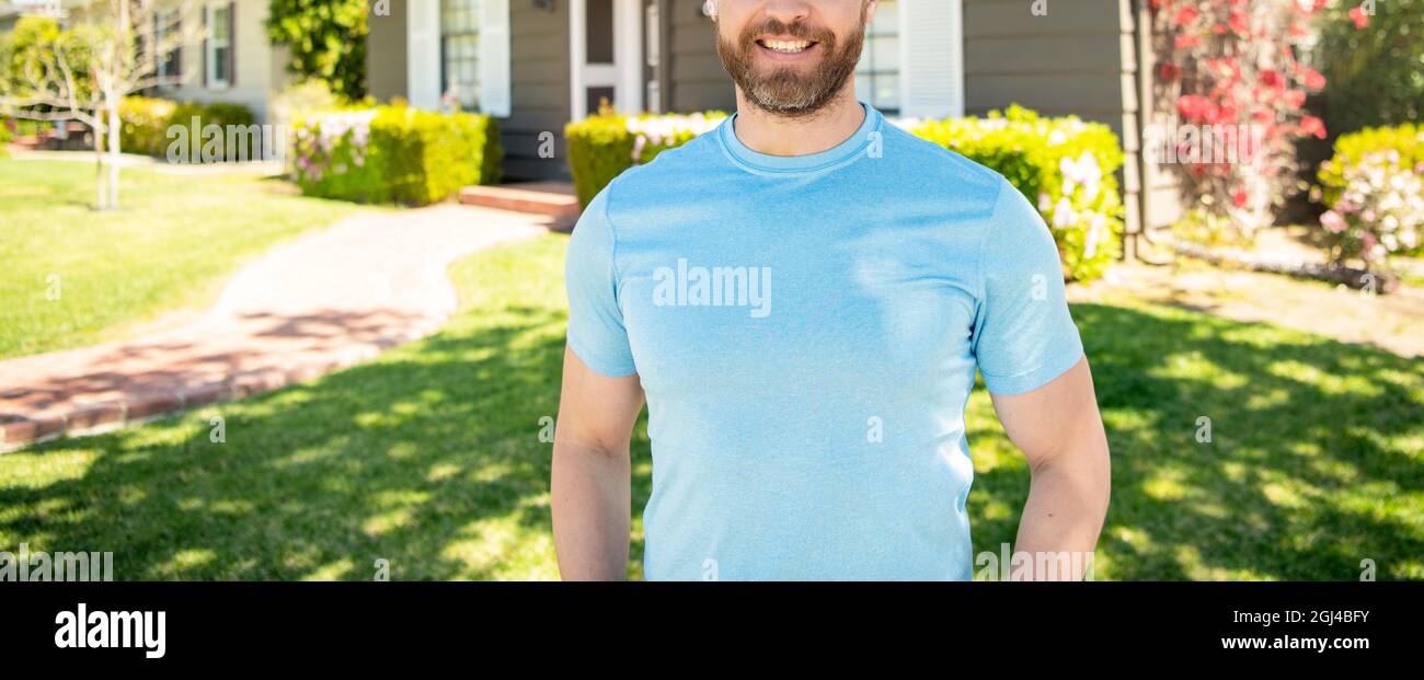 copped guy standing near house, ownership concept Stock Photo
