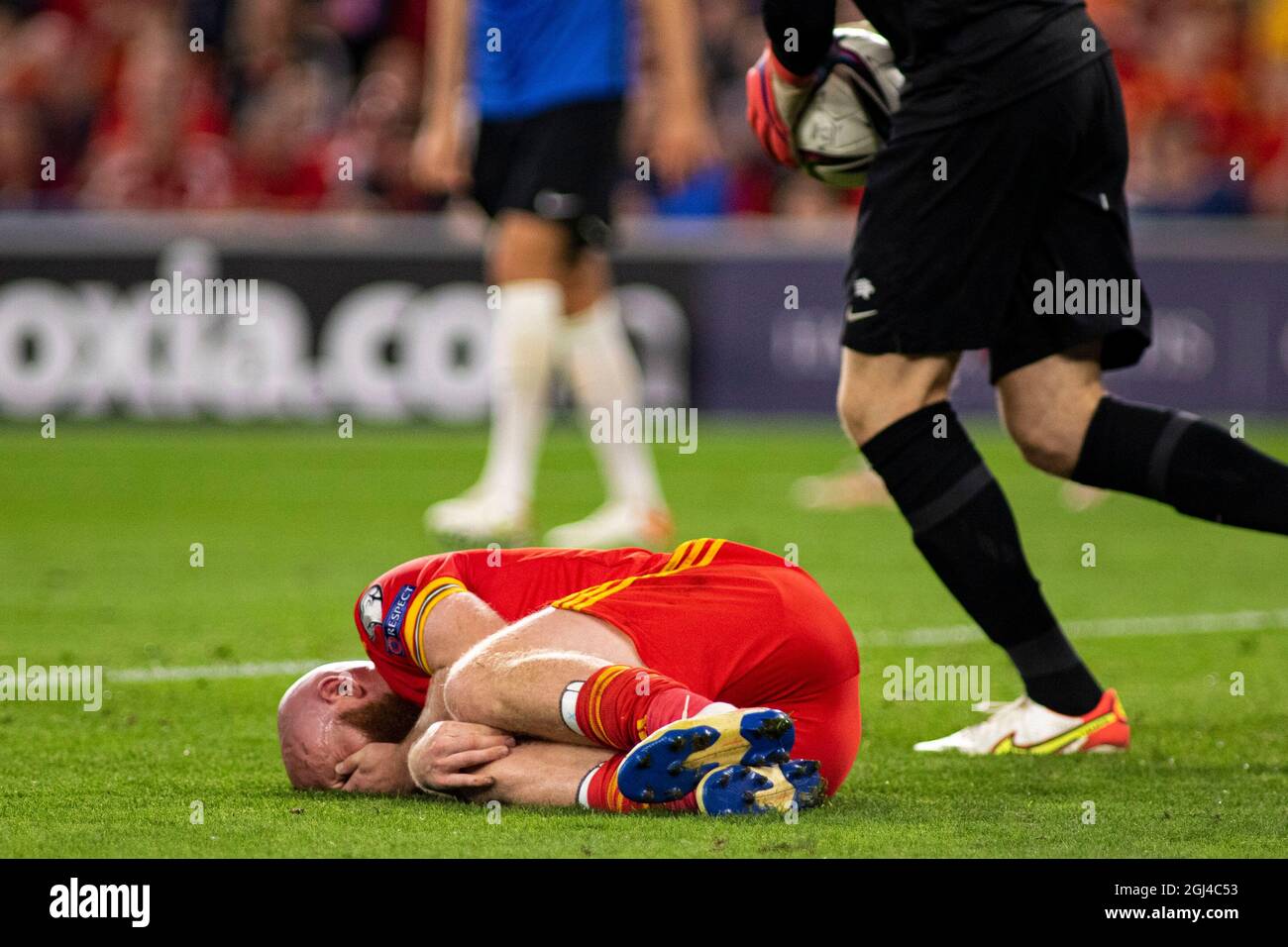 Cardiff, UK. 08th Sep, 2021. Estonia goalkeeper Karl Jakob Hein continues play with Jonny Williams of Wales down injured. Wales v Estonia in a 2022 FIFA World Cup Qualifier at the Cardiff City Stadium on the 8th September 2021. Credit: Lewis Mitchell/Alamy Live News Stock Photo