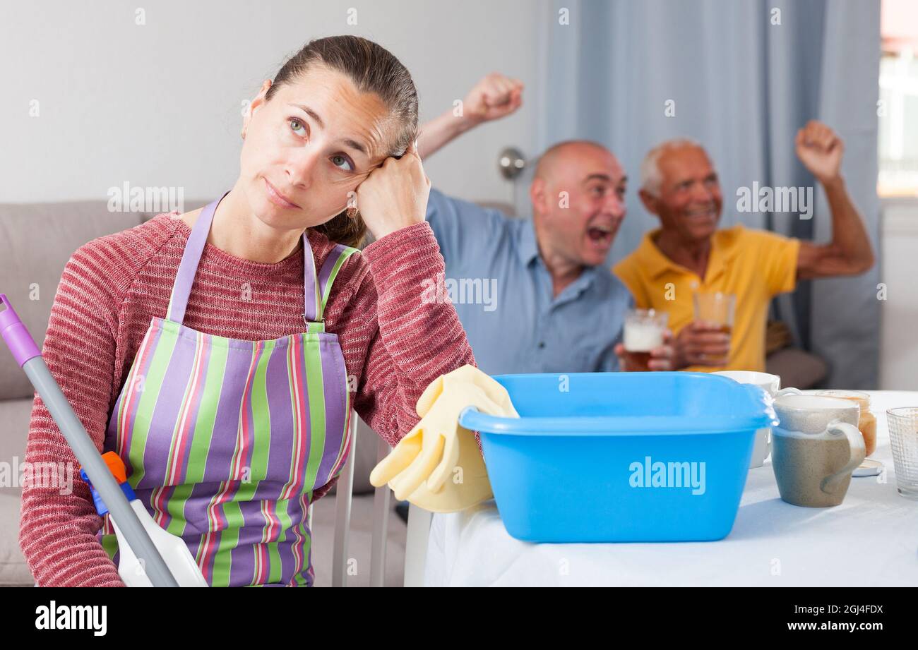 Woman housework man relax hi-res stock photography and images - Alamy