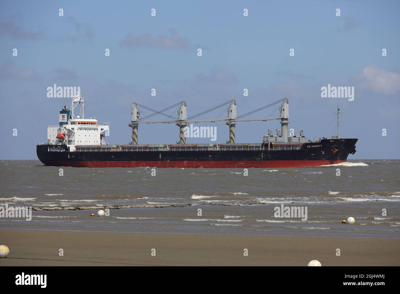 The bulk carrier ES Dignity will pass Cuxhaven on June 13, 2021 on its way to Brunsbüttel. Stock Photo
