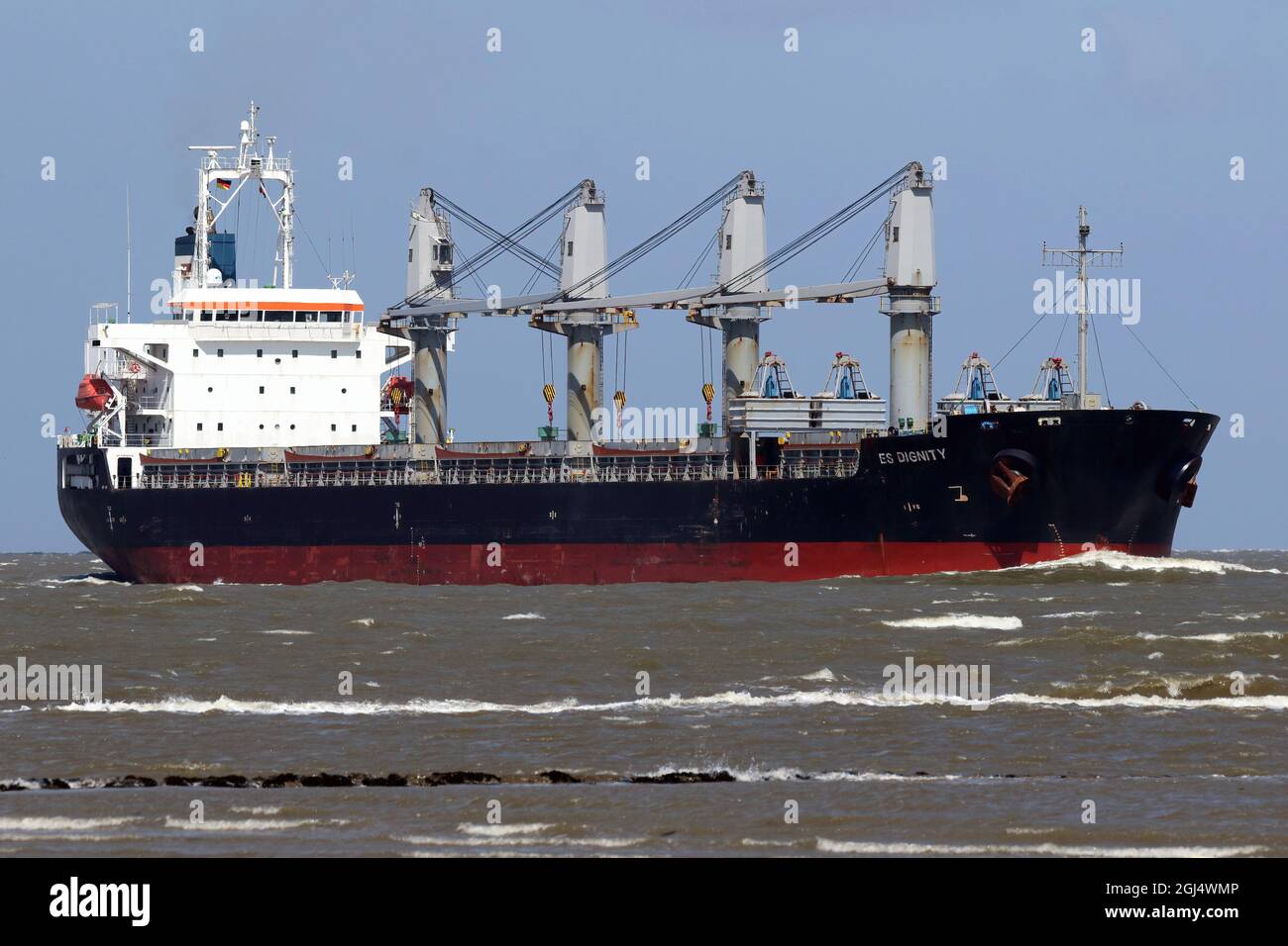 The bulk carrier ES Dignity will pass Cuxhaven on June 13, 2021 on its way to Brunsbüttel. Stock Photo