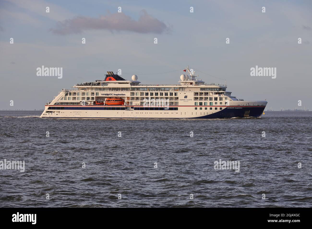The cruise ship Hanseatic Inspiration will pass Cuxhaven on June 15, 2021 on its way to the port of Hamburg. Stock Photo