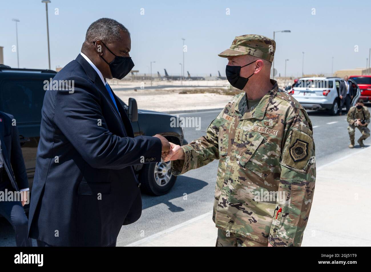 Secretary of Defense Lloyd J. Austin III greets Lt. Gen. Gregory M. Guillot Commander, Ninth Air Force (Air Forces Central), Southwest Asia. in Doha, Qatar, Sept. 7, 2021. Secretary Austin is meeting with regional partners and thank them for their cooperation with the United States as we evacuated Americans, Afghans and citizens from other nations from Afghanistan. He will reaffirm our strong defense relationships in the region. Secretary Austin will also meet with U.S. service members and U.S. government personnel to thank them for the skill and professionalism with which they conducted the e Stock Photo