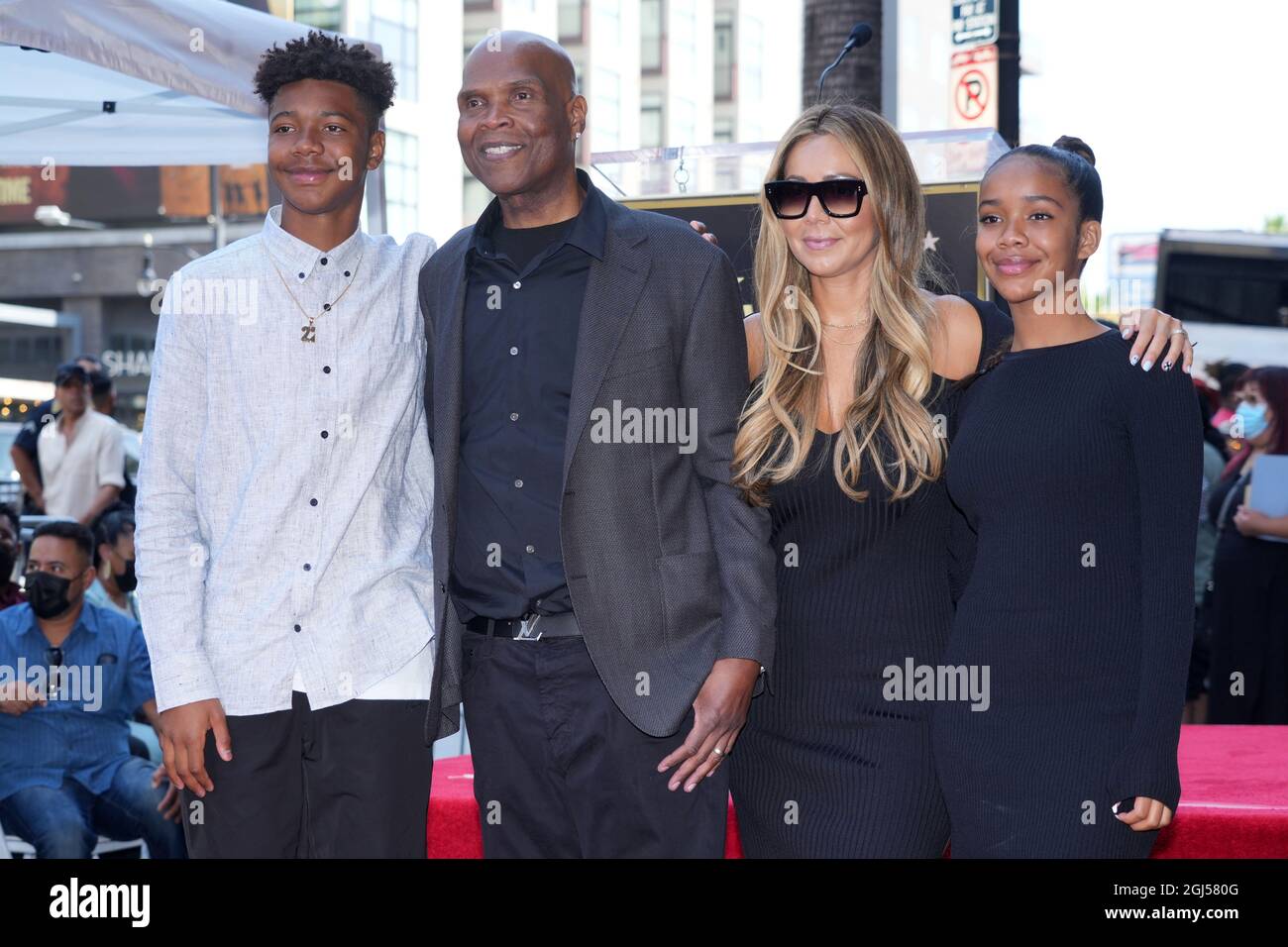 Radio personality Kurt Alexander aka Big Boy (second from left) poses with  son Jay Money Alexander (left), wife Veronica Alexander (second from right  Stock Photo - Alamy