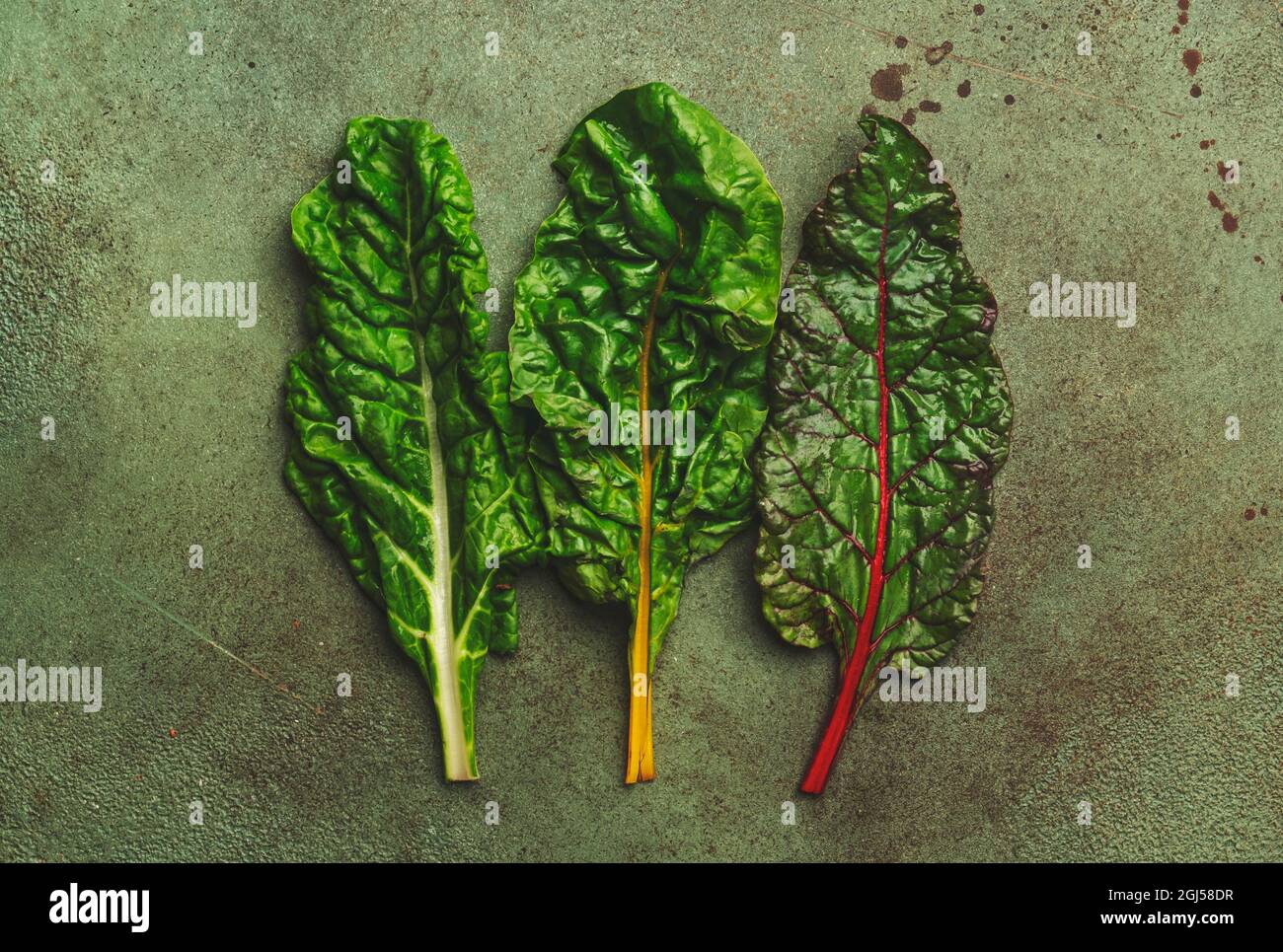 Rainbow Swiss Chard Leaves On Rusty Background Raw Green Leaf Vegetables Top View Copy Space Stock Photo Alamy
