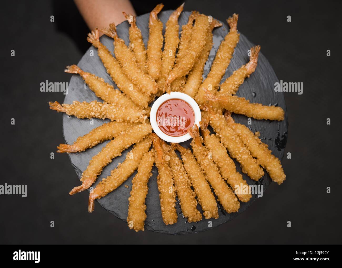Delicious shrimp king prawn platter starter battered with dip on slate