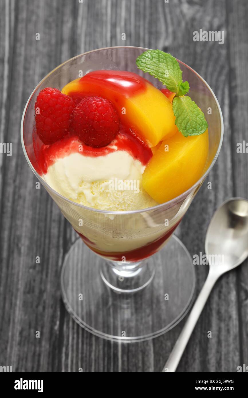 Peach Melba is a summer dessert made by Escoffier with peaches, ice