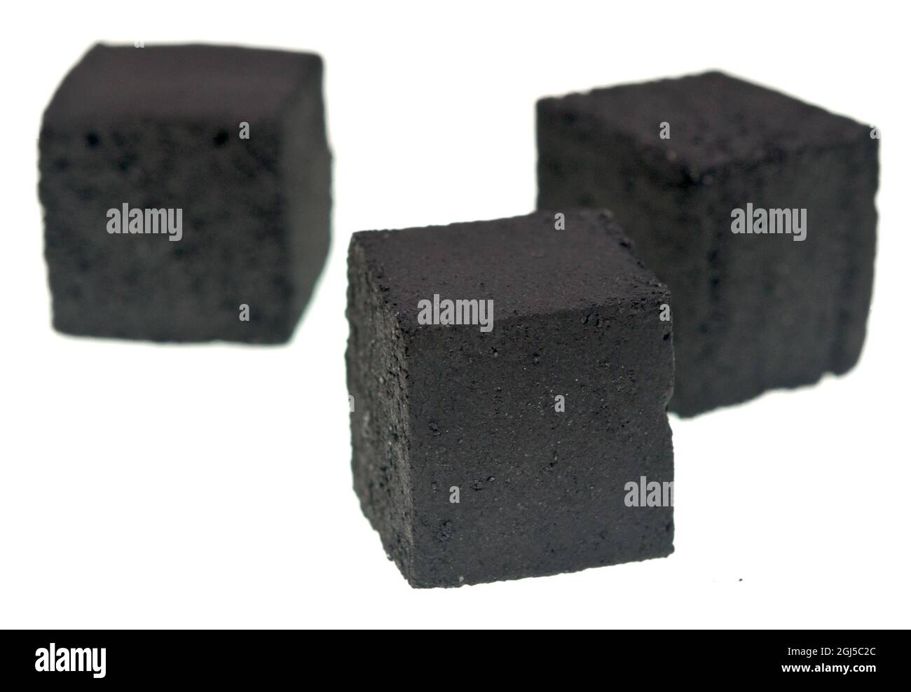 Charcoal cubes for hookah on white background Stock Photo