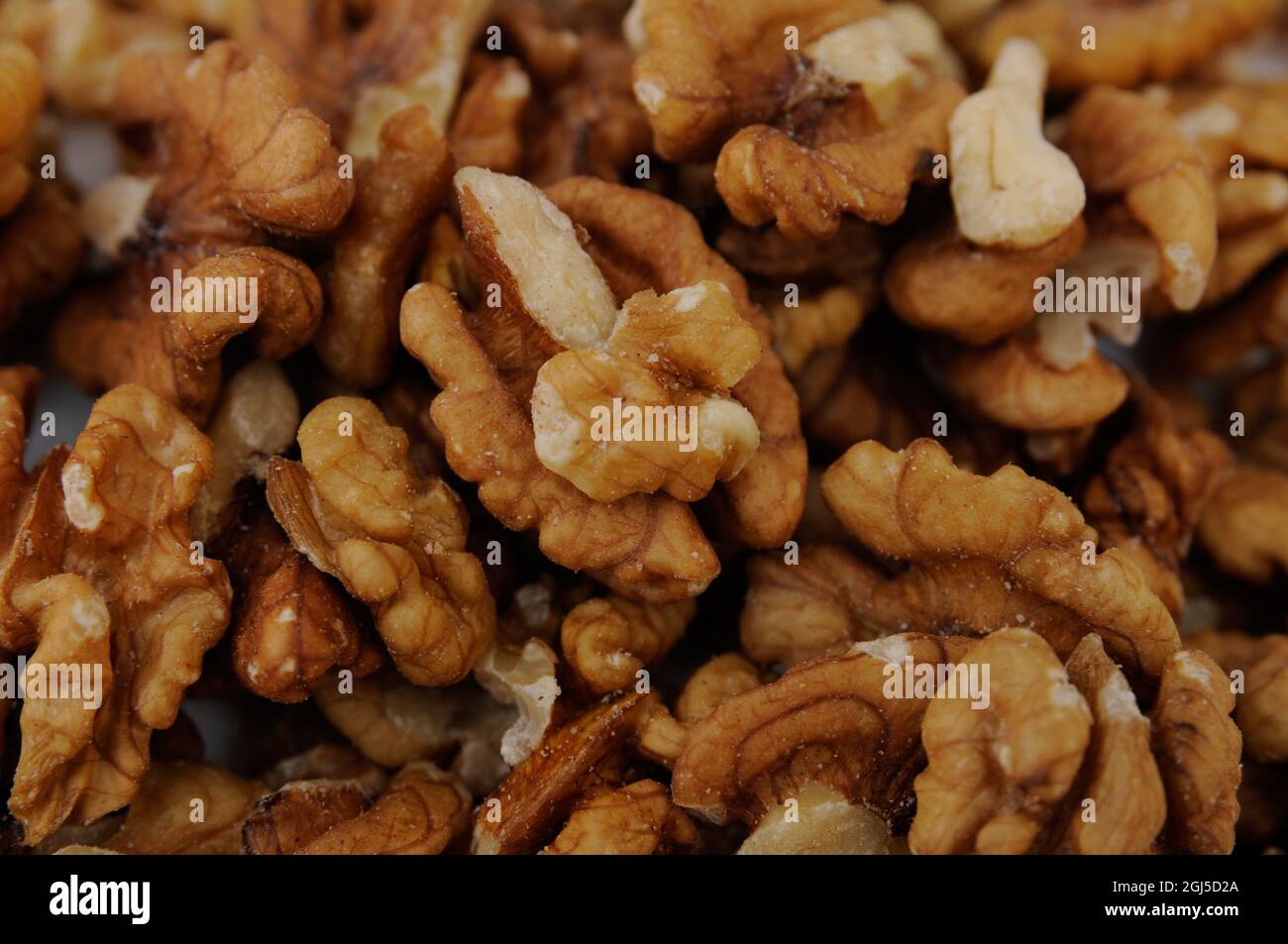 Closeup of big walnuts pile Stock Photo