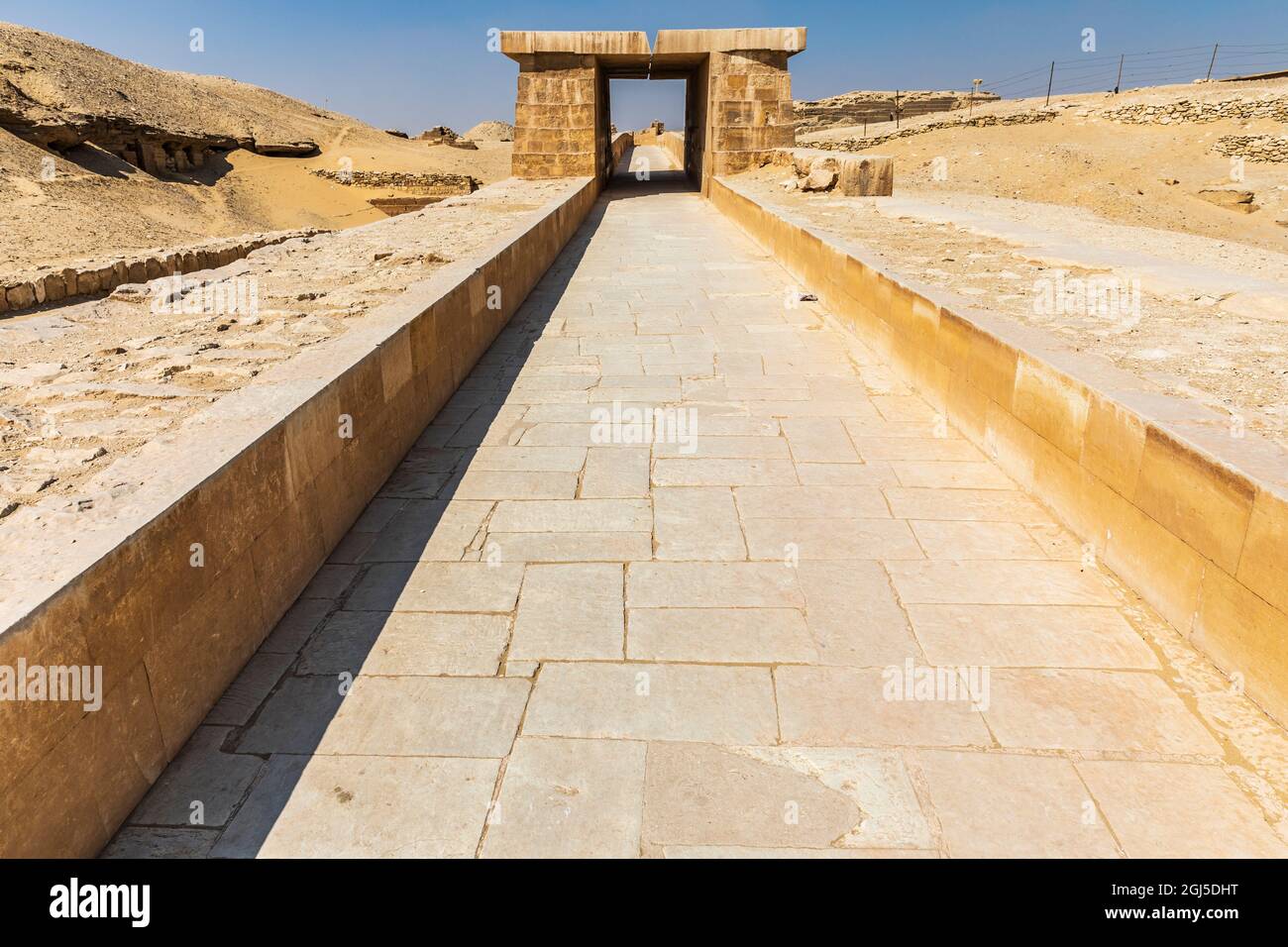 Africa, Egypt, Saqqara. Causeway near the Step Pyramid of Djoser in the Saqqara Necropolis. Stock Photo