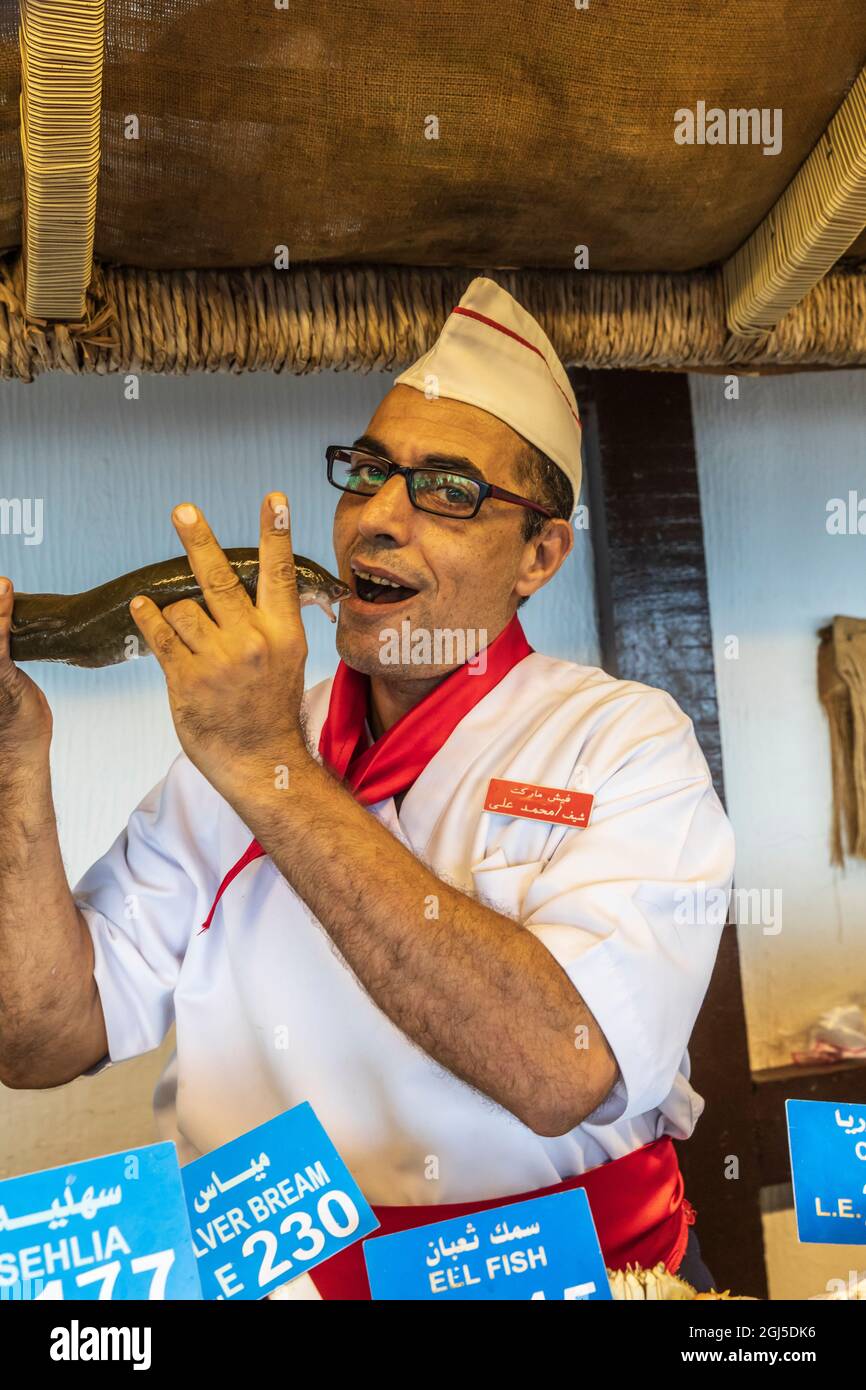 Africa, Egypt, Alexandria. October 5, 2018. Vendor with an eel at the