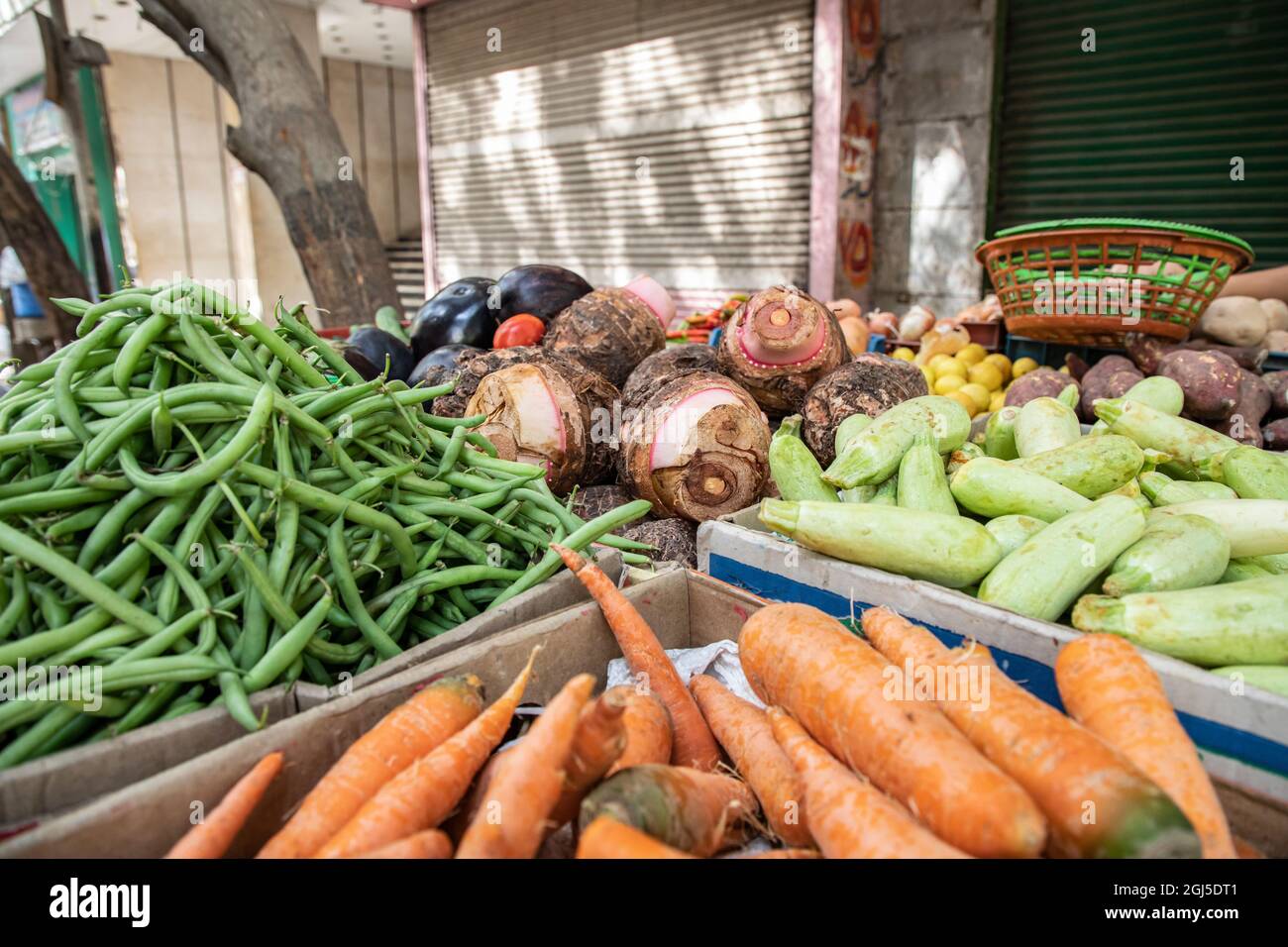 Africa, Egypt, Cairo. Vegetable stand at the Souk al Gomaa Friday