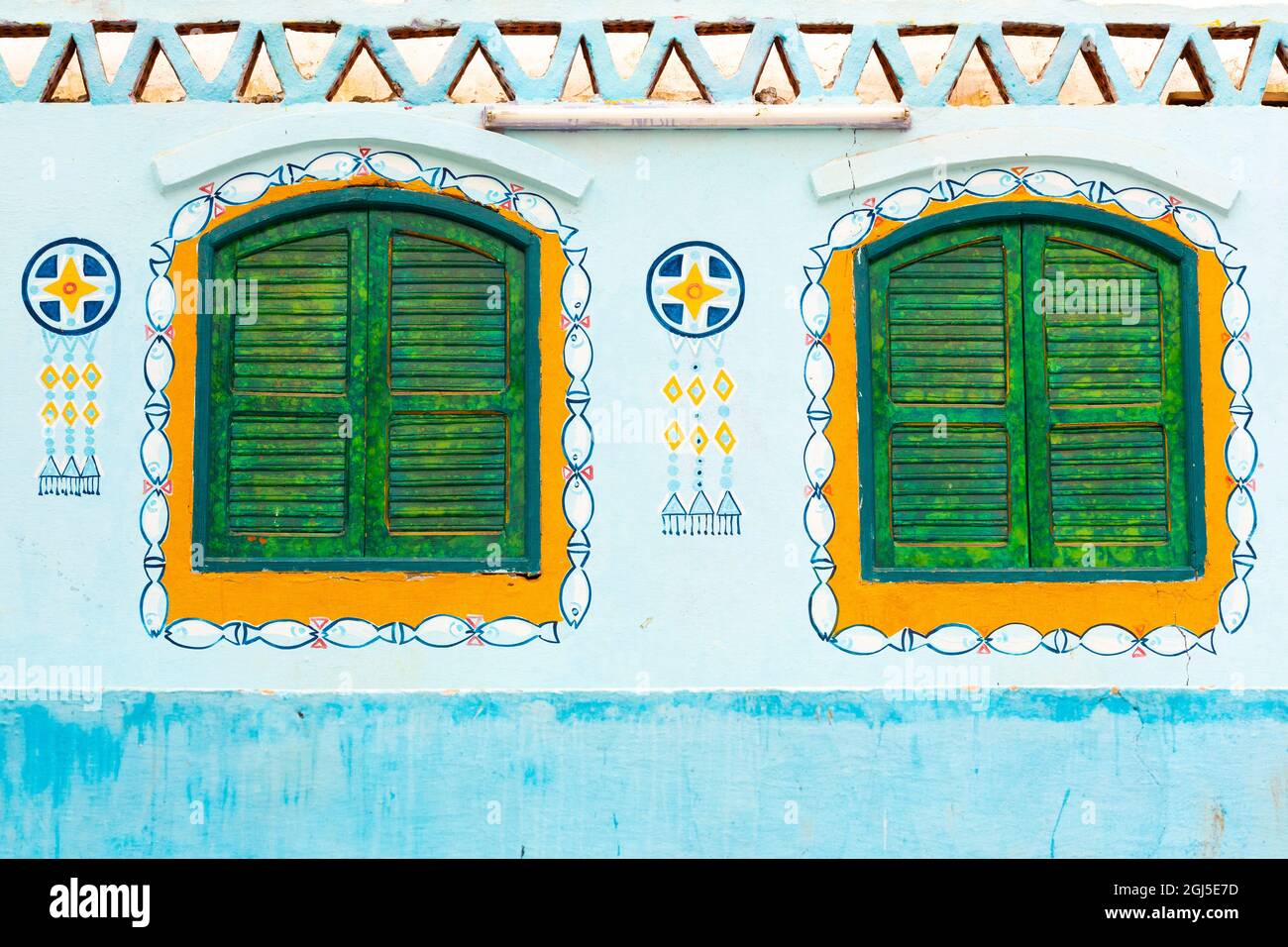 Egypt. Colorful painted wall and window shutters. Nubian village on