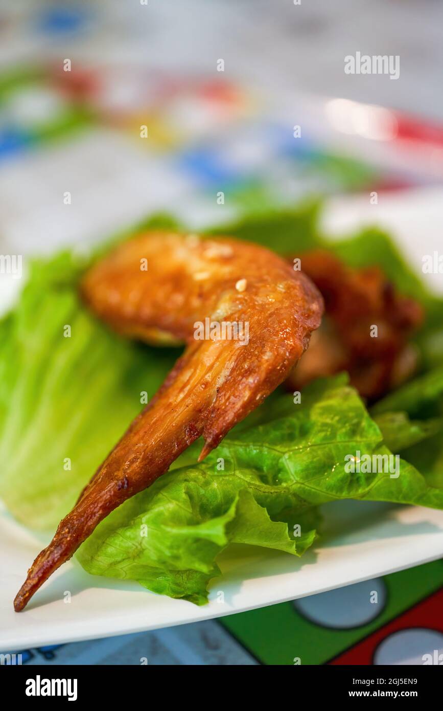 Deep-fried chicken wings in a Hong Kong tea restaurant Stock Photo