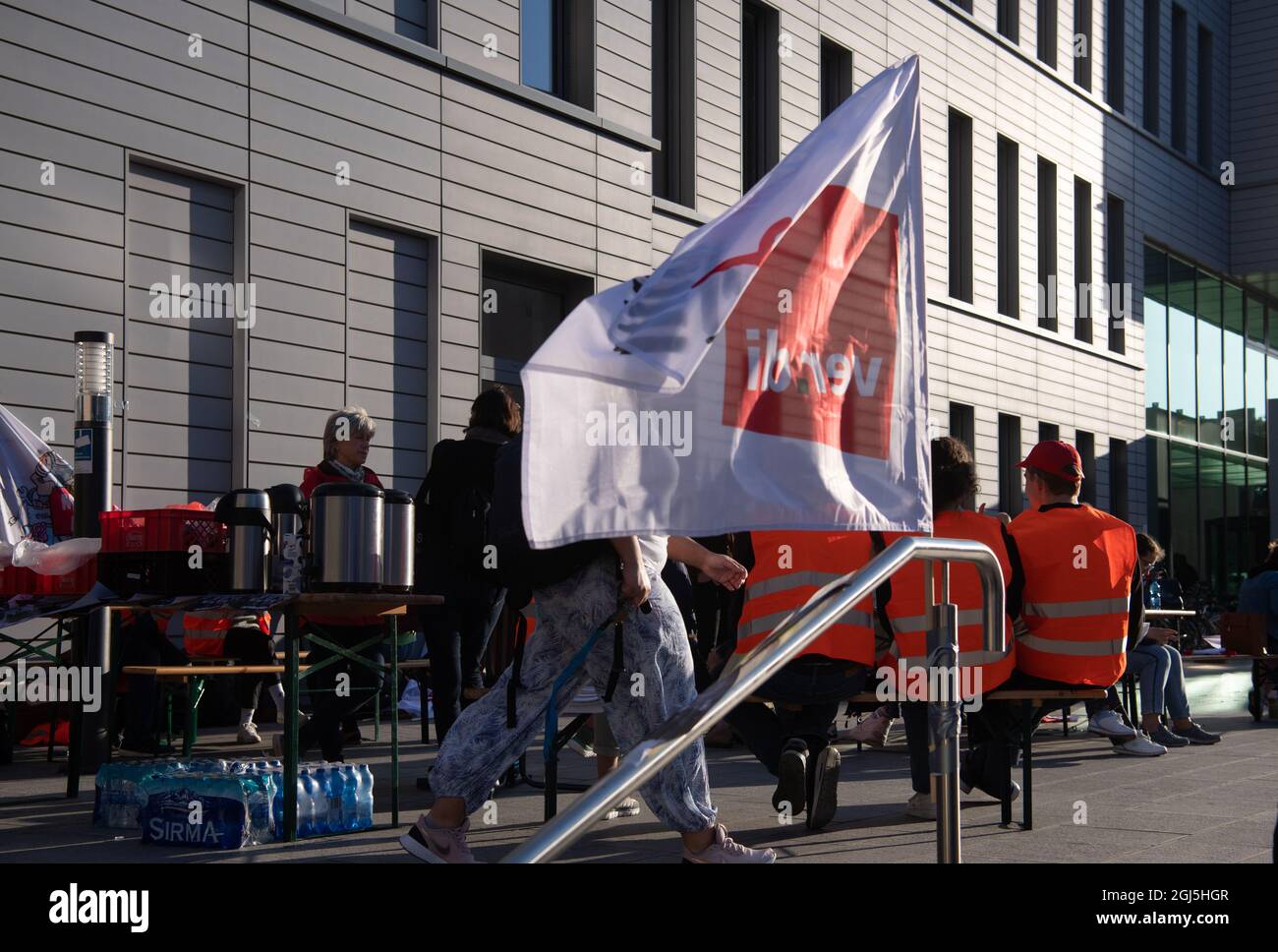 Berlin, Germany. 09th Sep, 2021. A flag of the trade union Verdi flies in front of the Charité's ward block- There, the employees of the state-owned Berlin hospitals Vivantes and Charité went on an indefinite strike this morning. The union Verdi fights for collective agreements that lead to a relief of the employees, for example by setting minimum staffing levels for wards and departments. Credit: Paul Zinken/dpa/Alamy Live News Stock Photo