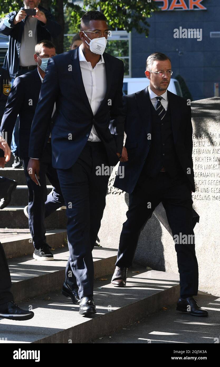 Munich, Germany. 09th Sep, 2021. Professional footballer and former national player Jerome Boateng (l) arrives with bodyguards and lawyer Kai Walden for the start of the trial at the Munich District Court in the Criminal Justice Center. He has to answer for the accusation of assault. Credit: Angelika Warmuth/dpa/Alamy Live News Stock Photo