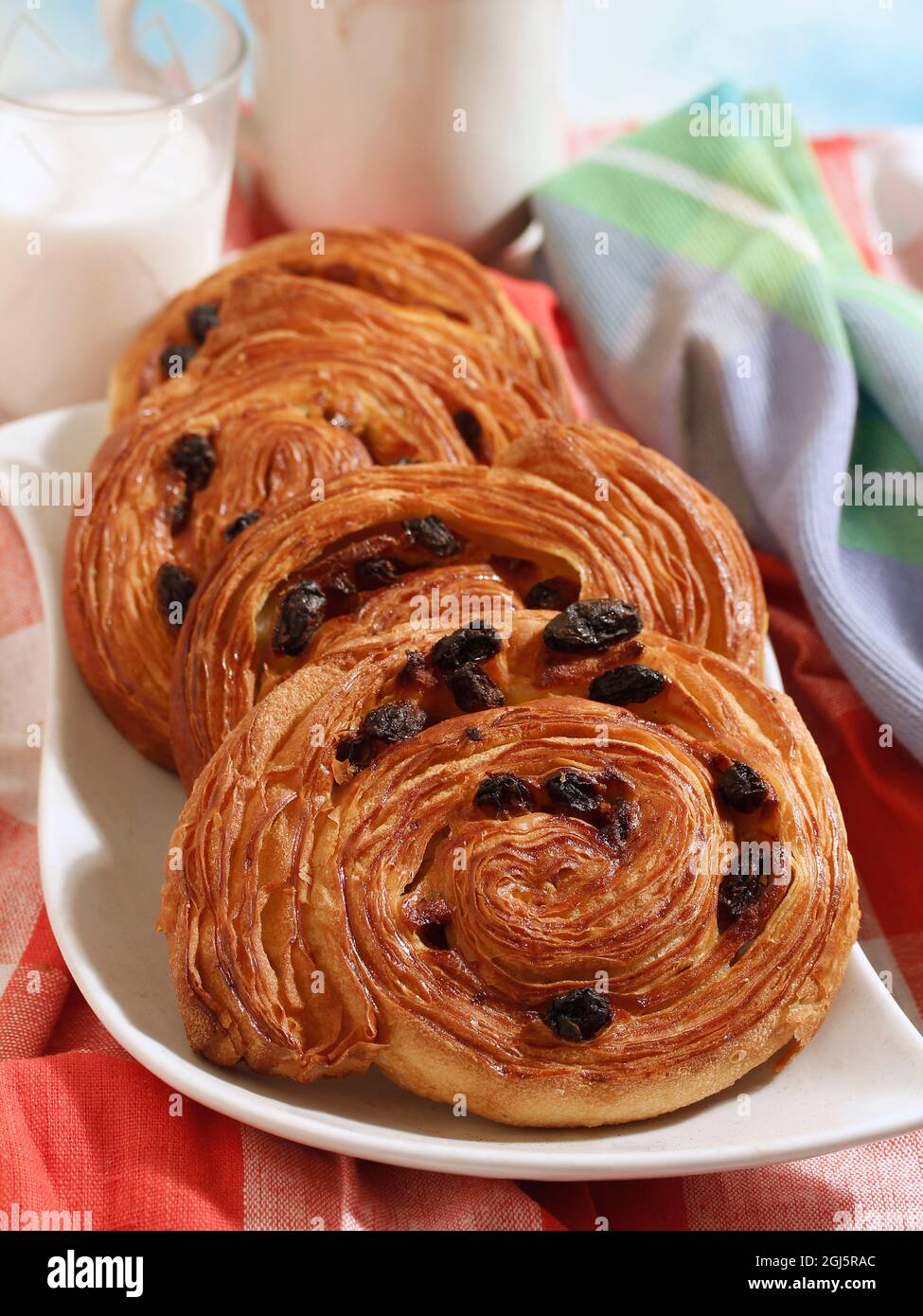 Schneckens. Pastry with raisins. Stock Photo