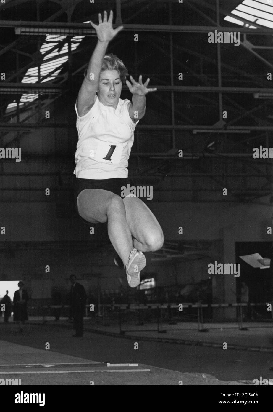 Mary Denise Rand , MBE , ( née Bignal ) ( born 10 February 1940 ) is a former English track - and - field athlete . She won the gold medal in the long jump at the 1964 Summer Olympics by breaking the world record , becoming the first - ever British female to win an Olympic gold medal in a track and field event Stock Photo
