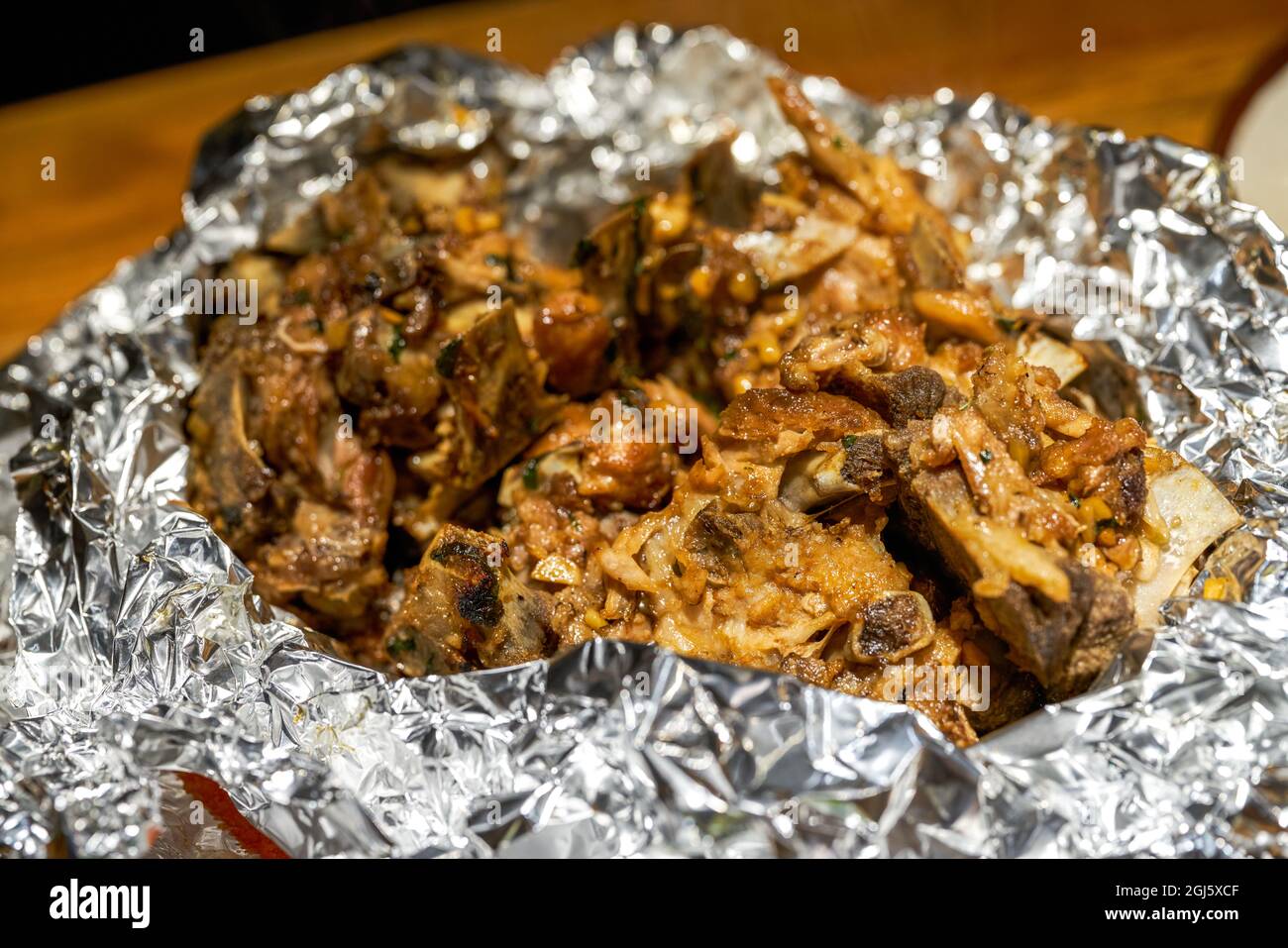 A delicious Thaistyle tin foil braised pork ribs Stock Photo Alamy