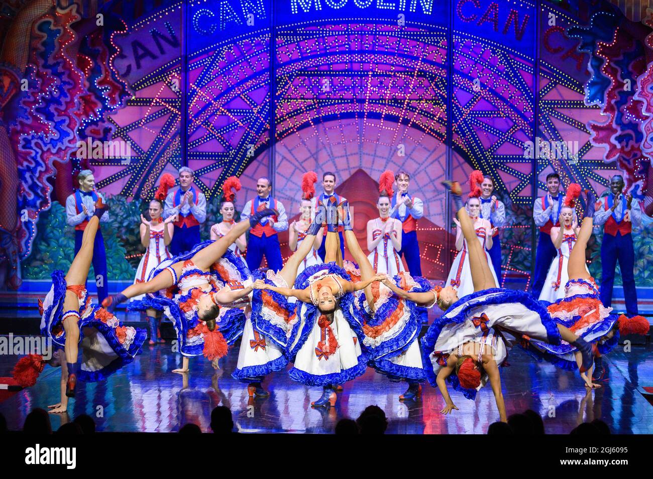 https://c8.alamy.com/comp/2GJ6095/dancers-performs-the-feerie-show-on-the-stage-of-the-moulin-rouge-set-to-reopen-on-september-10-for-the-first-time-since-the-covid-19-pandemic-restrictions-in-paris-france-on-september-8-2021-the-french-cabaret-famous-for-its-high-kicking-cancan-dancers-and-flesh-exposing-ostrich-feather-costumes-marked-last-year-130-years-since-it-first-opened-its-doors-to-audiences-for-two-performances-every-evening-60-performers-from-14-different-countries-twirl-kick-and-dance-their-way-through-the-feerie-show-the-review-that-is-now-the-mainstay-of-the-moulin-rouges-repertoire-photo-by-eli-2GJ6095.jpg