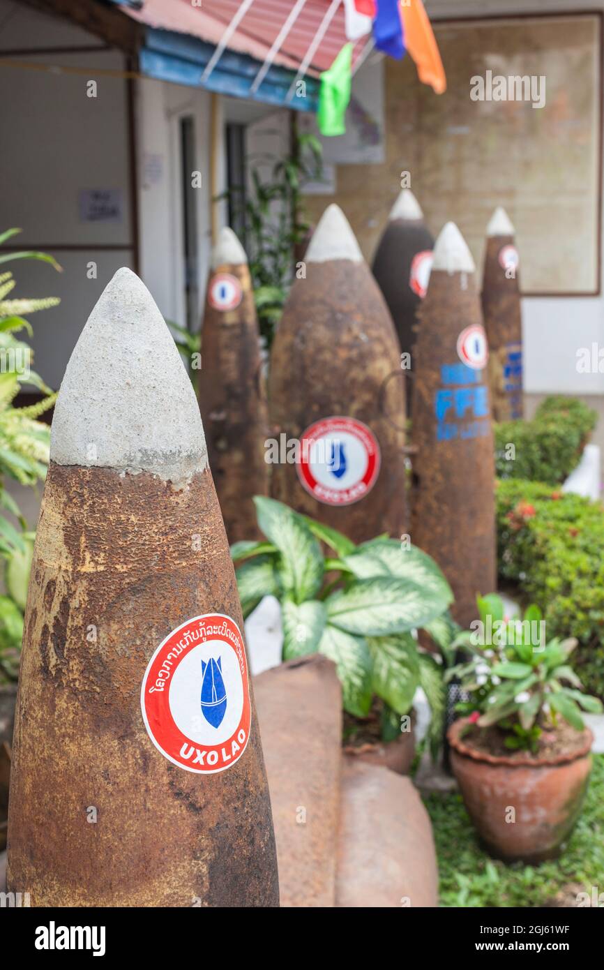 Laos, Luang Prabang. UXO Laos Information Center, organization dedicated to clearing unexploded ordnance, exterior with bombs. Stock Photo