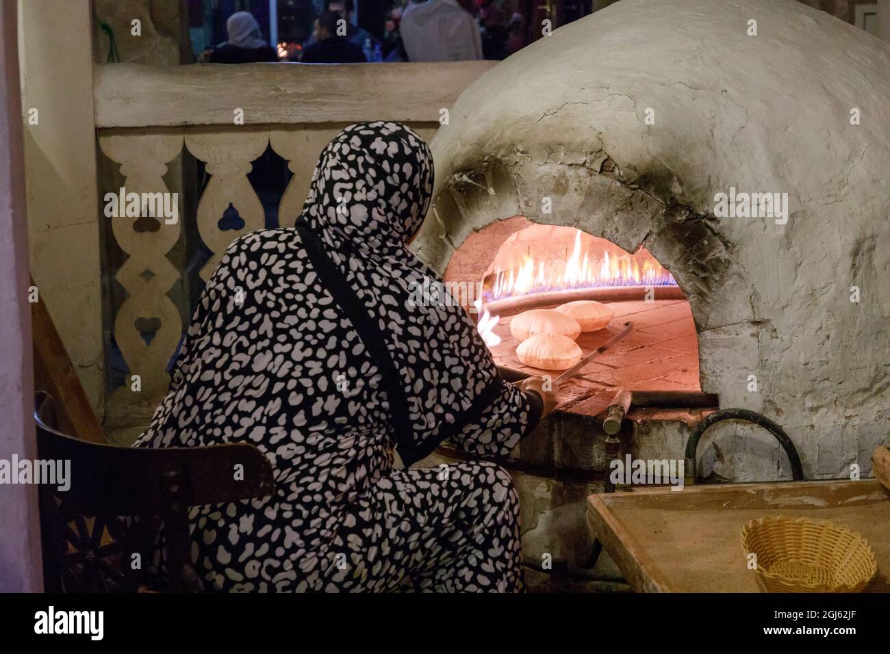 State of Qatar, Doha. Traditional bread baking. (Editorial Use Only Stock Photo Alamy