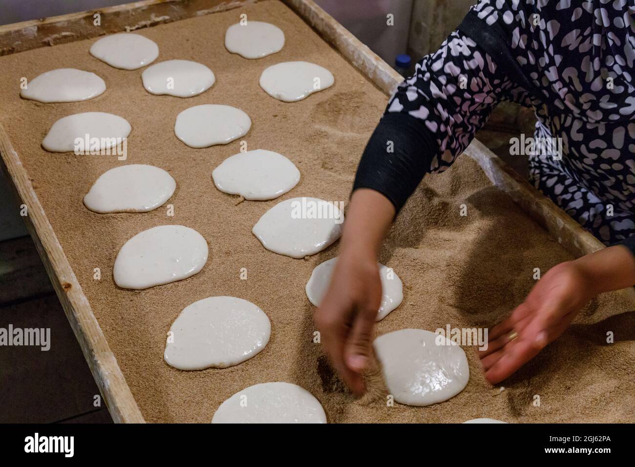 State of Qatar, Doha. Traditional bread making Stock Photo Alamy