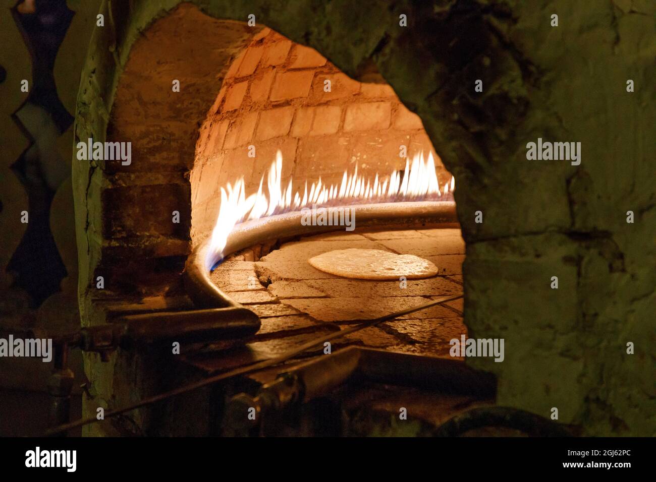 State of Qatar, Doha. Traditional bread baking Stock Photo Alamy