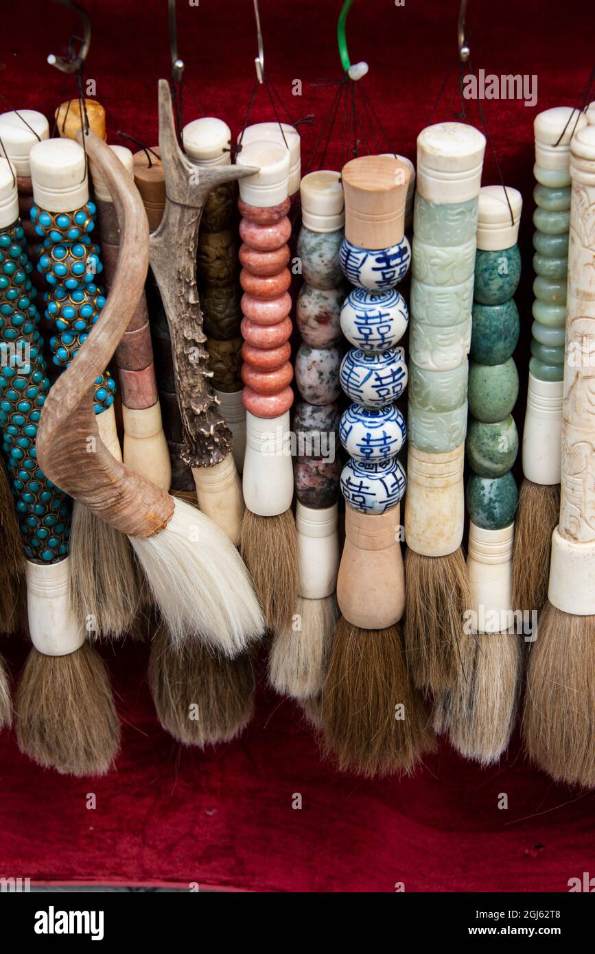 Singapore, Chinatown. Detail of typical onion brush souvenirs Stock