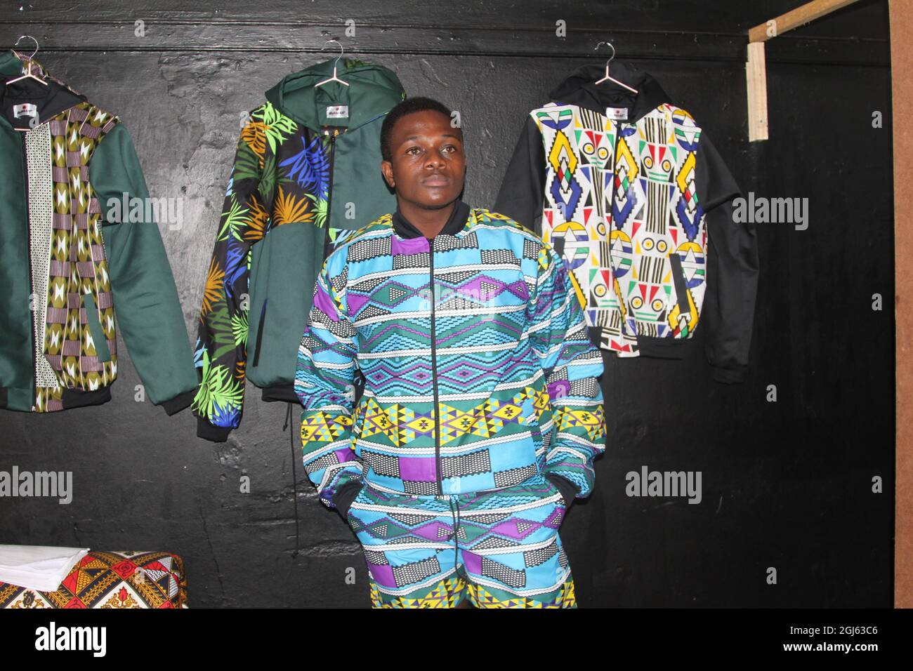 Harare, Zimbabwe. 1st Sep, 2021. A man wearing an outfit made from African print fabric poses for a photo in Harare, capital of Zimbabwe, Sept. 1, 2021. Bakari Sibanda, founder and creative director of Harare-based #byBakari fashion brand, uses African print fabric to make stylish clothing that reflects the artistic expression of African culture. TO GO WITH 'Feature: Zimbabwean fashion entrepreneur fuses tradition with modernity in eye-catching ways' Credit: Tafara Mugwara/Xinhua/Alamy Live News Stock Photo