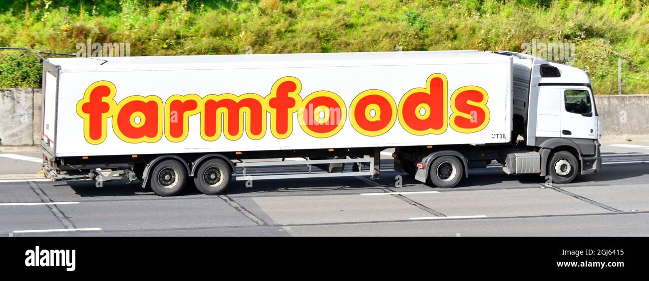 British farmfoods frozen food supermarket retail business supply chain delivery lorry truck & brand logo graphic side view on articulated trailer UK Stock Photo