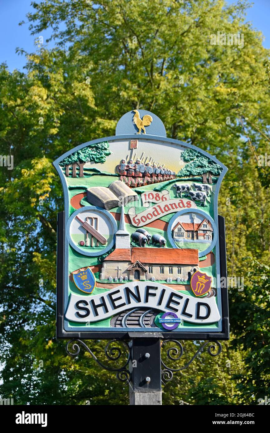 Close up Shenfield town sign of historical references back to Roman times & logo for new Crossrail Elizabeth train line terminating here in Essex UK Stock Photo