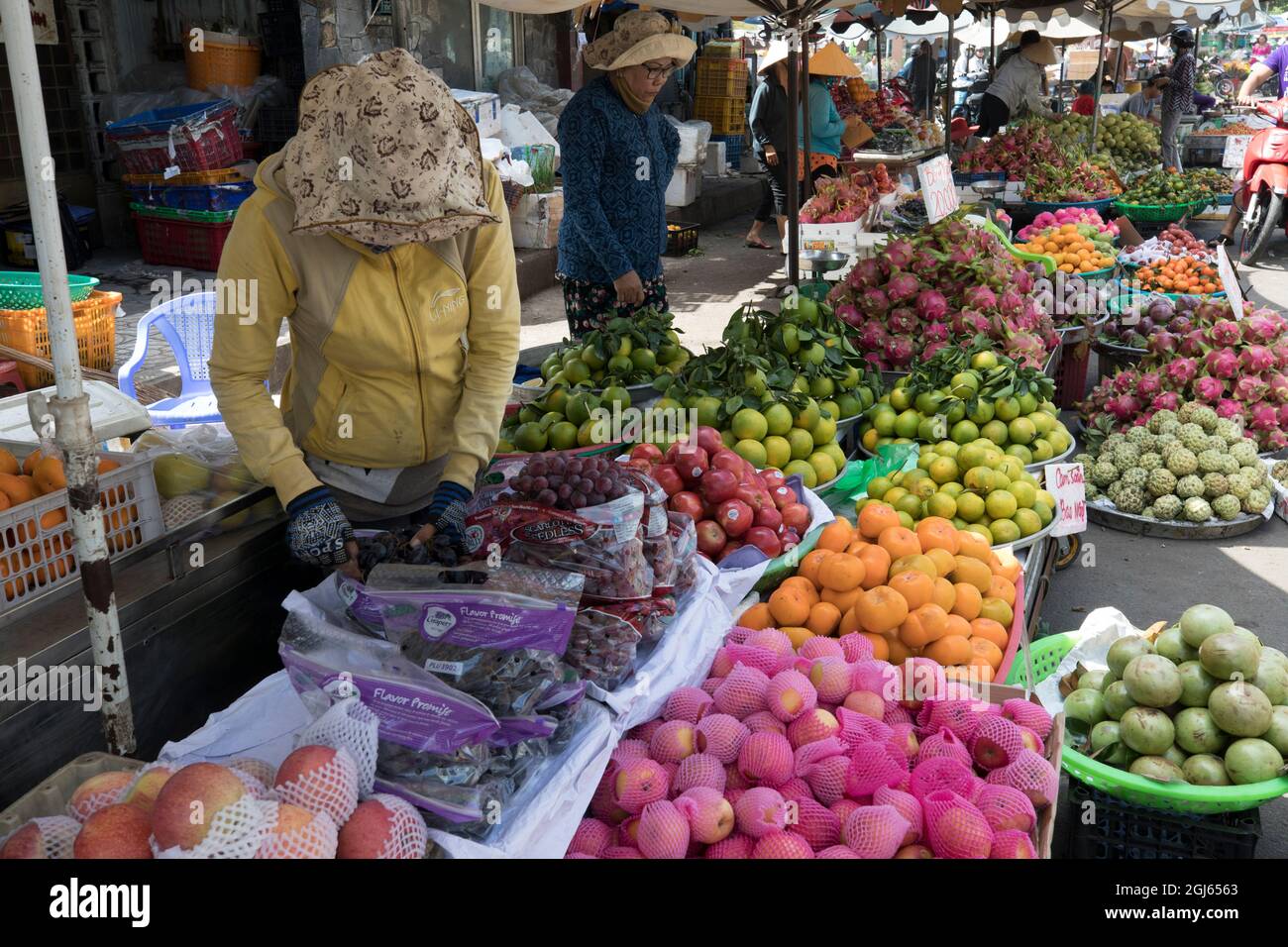 Outside trading stalls with fruit and vegetables in Saigon, Vietnam