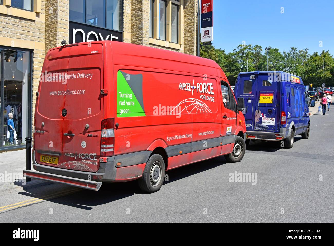 Red Parcel Force shop store supply chain Mercedes Sprinter delivery van &  blue G4S high value security transport Skipton North Yorkshire England UK  Stock Photo - Alamy